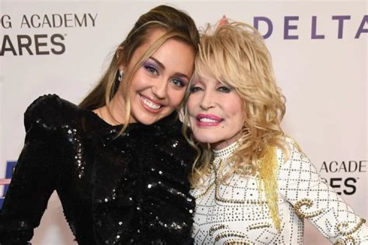 Miley Cyrus (L) and Dolly Parton attend MusiCares Person of the Year honoring Dolly Parton at Los Angeles Convention Center. | Photo: Getty Images