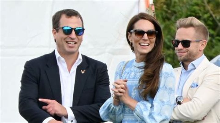 Peter Phillips enjoys a laugh with Princess Kate at cousin William's polo match