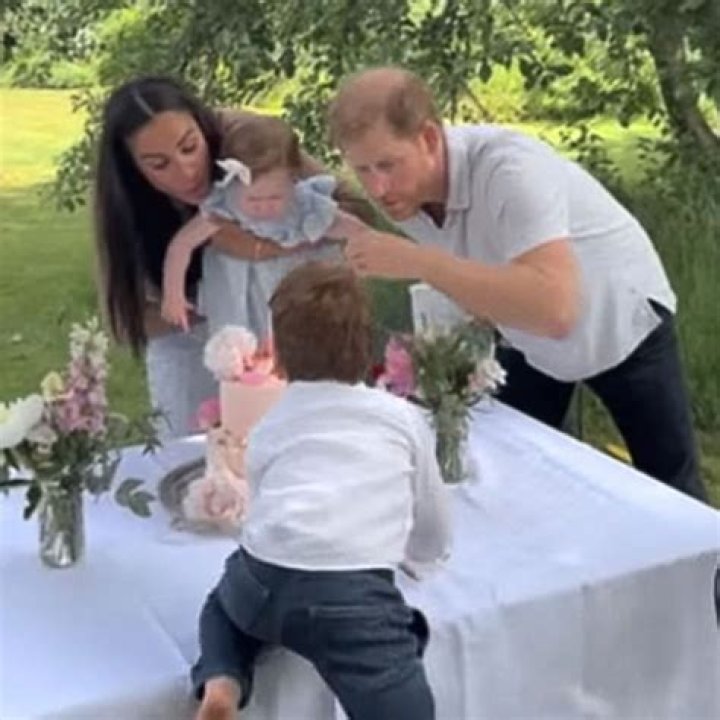 Prince Harry smiling at Princess Anne