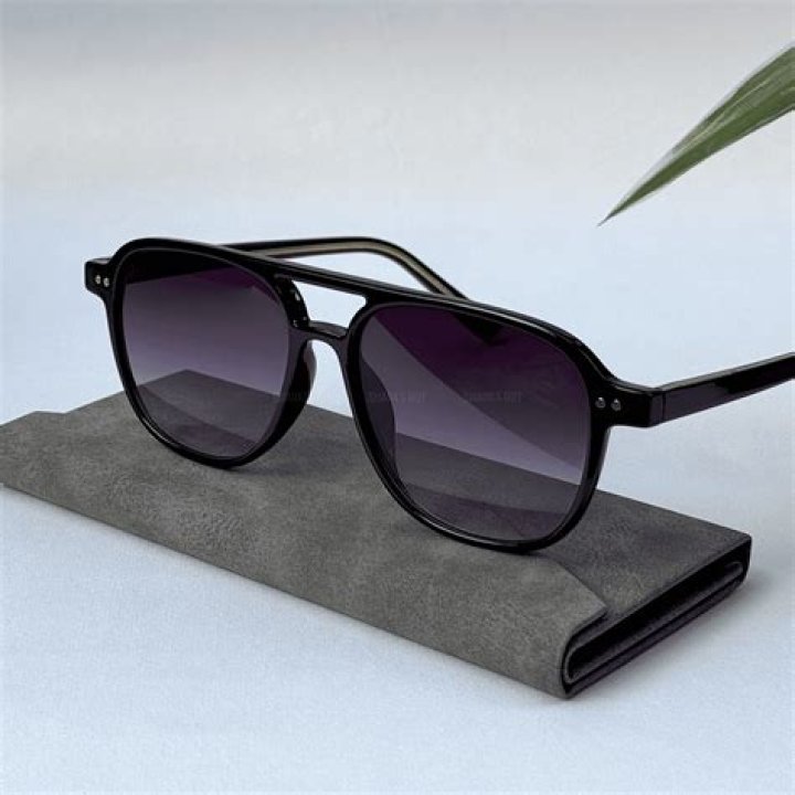 Shades: She sported dark sunglasses as she posed up a storm